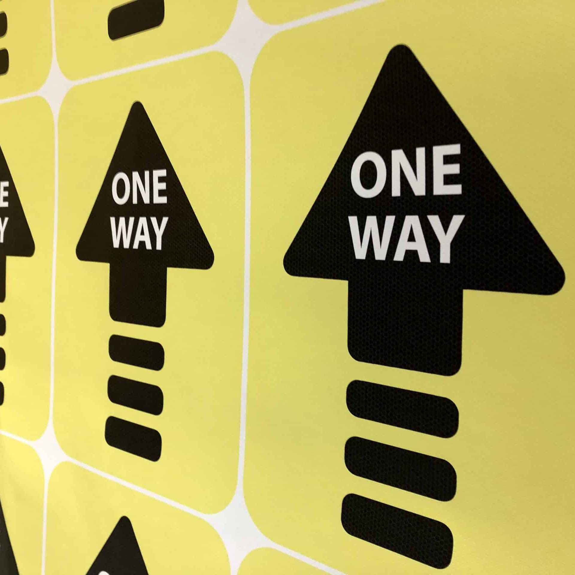 One Way directional wayfinding stickers in the process of being printed