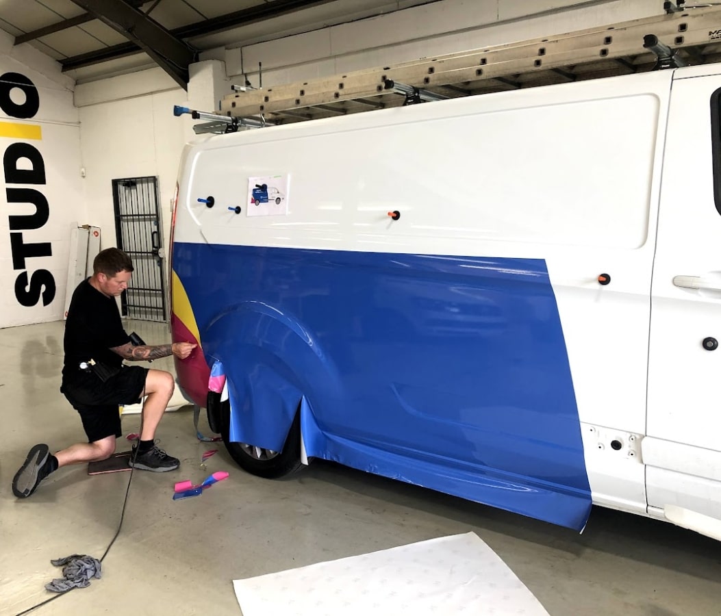 vehicle wrapping being applied